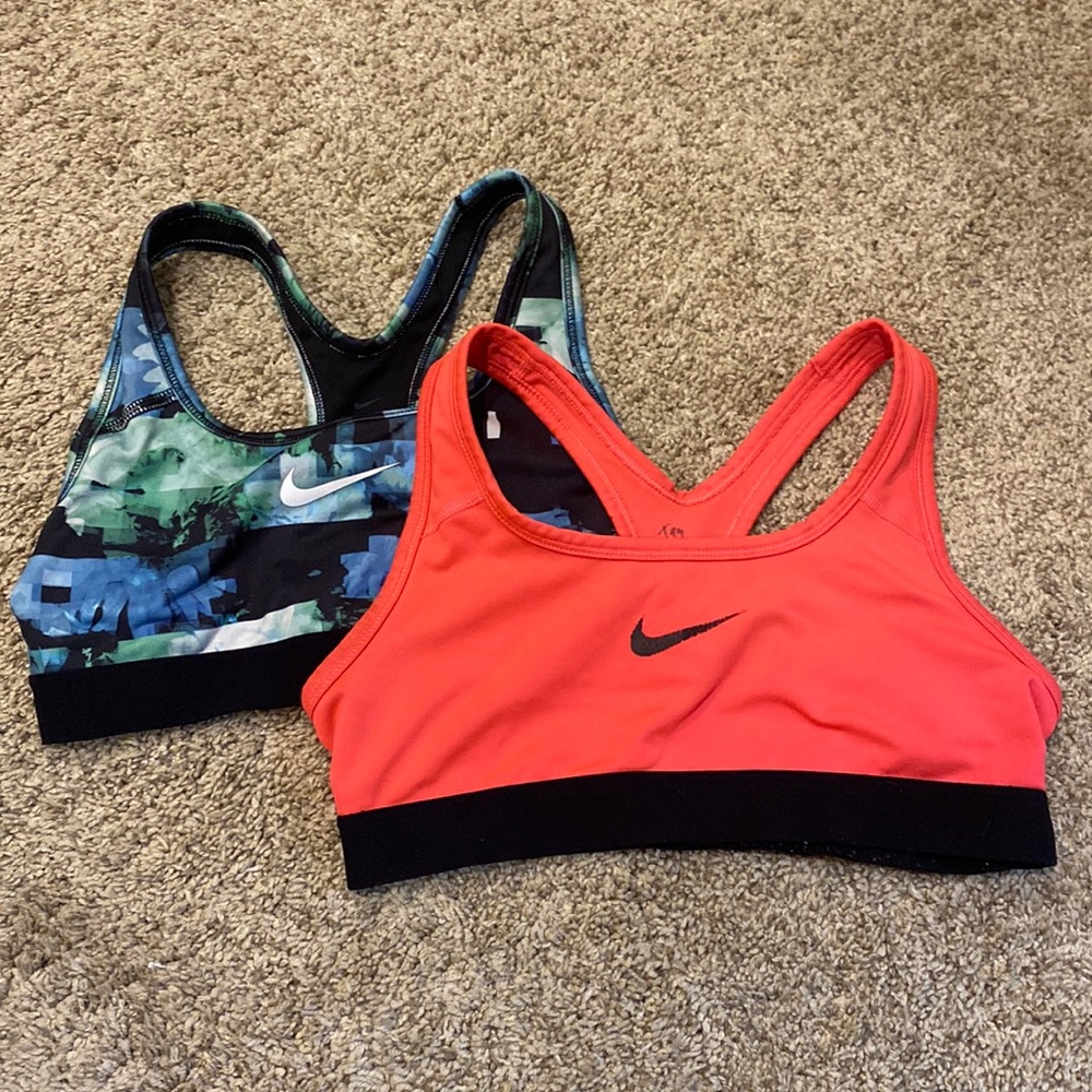 Two Nike bras.